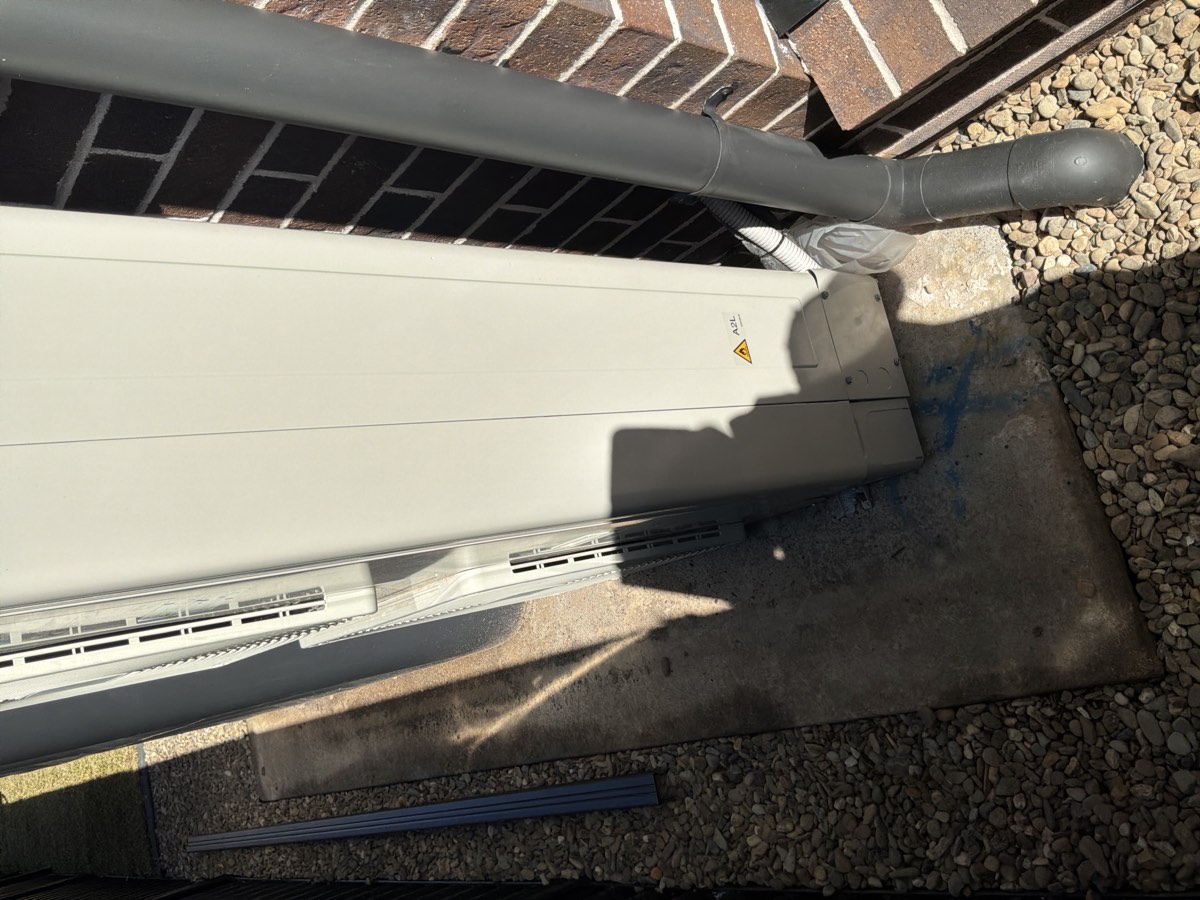 Air conditioner drainage on the ground, recorded on a handover inspection in Riverstone